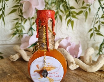 Faith of the feniks fantasy potion bottle, kleurveranderend drankje, magie, feniks, vleugels.