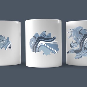 May include: Three white ceramic mugs with a blue and white marbled design. The design is a silhouette of a dinosaur.