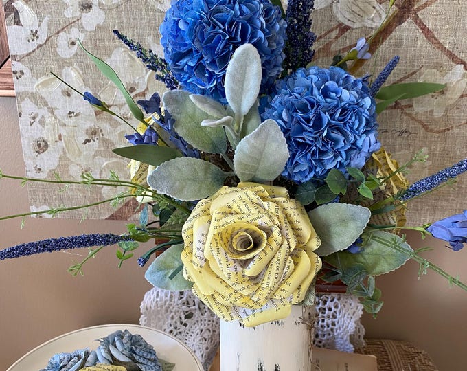 Featured listing image: Yellow Book Page Roses and Blue Hydrangeas Arrangement