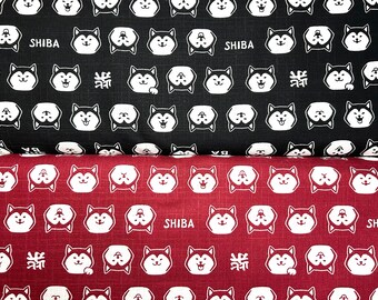 May include: Two fabric swatches with a repeating pattern of Shiba Inu dog faces. The top swatch is black with white Shiba Inu faces and the text "SHIBA". The bottom swatch is red with white Shiba Inu faces and the text "SHIBA".