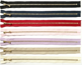 Cremalleras YKK de 30 cm, deslizador y dientes de bola color oro metalizado