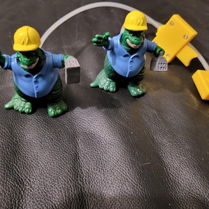 Dinosaurs  &quot;Dino-Motion&quot; 1 Earl Sinclair McDonalds Happy Meal Toy 1993 Disney and Jim Henson
