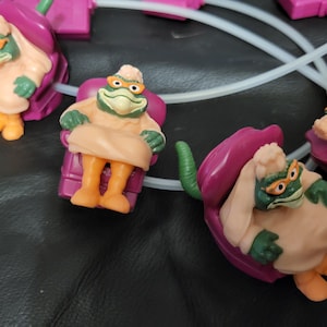 Dinosaurs &quot;Dino-Motion&quot; 1 Ethyl Sinclair McDonalds Happy Meal Toy 1993 Disney and Jim Henson