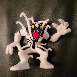 Anti-Venom white/black Imaginext from battle against Venom 2012