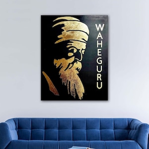 May include: A black and gold canvas print featuring a silhouette of a man with a beard and turban. The text "WAHEGURU" is written vertically on the right side of the image.