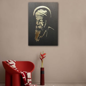 以下が含まれることがあります： 黒い背景に、ひげとターバンをつけた男性の金のシルエット