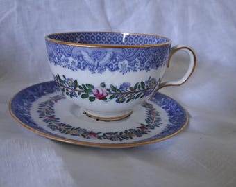 Taza y platillo Spode Coperland vintage azul y blanco, hallazgo raro, flores coloridas