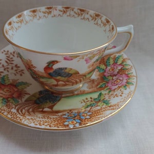 Vintage Sutherland China &quot;EXOTIC&quot; pattern teacup and saucer, Asian scenery, Chinese flowers, handpainted peacock, asian-inspired cup