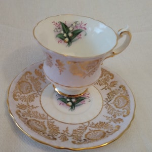 Vintage Paragon Tea Cup and Saucer Lily of The Valley Flower gold flowers footed