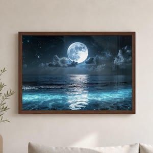 Moon Wall Art featuring a glowing full moon over the ocean, with silver light reflecting across dark blue water, soft clouds, scattered stars, and turquoise waves near the shore. This peaceful Ocean Wall Art brings a calming coastal theme to beach house decor, bathroom art, bedroom decoration, or maritime style wall decor.