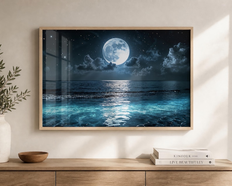 Echoes of a Rising Moon wall decor featuring a serene nighttime ocean scene with a large moon above the horizon, shimmering reflections on the water, starry sky details, and glowing turquoise surf. This Moon Wall Art adds peaceful maritime style to coastal bedrooms, bathrooms, beach houses, or ocean themed interiors.