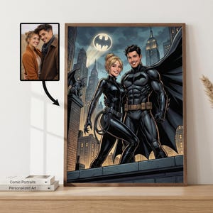 May include: A framed comic-style portrait of Batman and Catwoman standing on a rooftop with a cityscape background. The artwork features a couple in the style of a comic book. A smaller framed photo of a couple is also present.