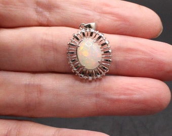 Ethiopische opaalhanger: 925 sterlingzilver, regenboogflits