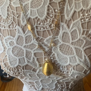 Gold Glass Egg Pendant Necklace Accented with Pearls