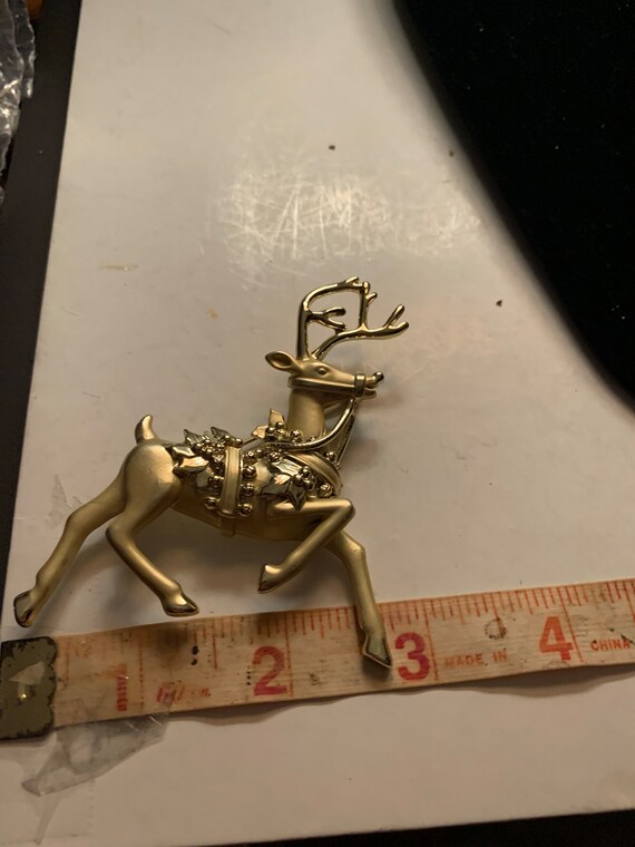 Reindeer brooch store