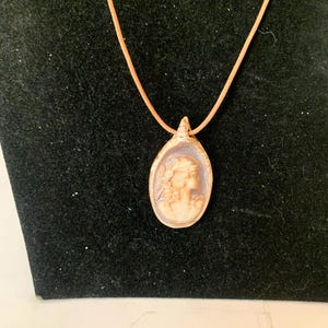 Cameo Carved From Stone Pendant