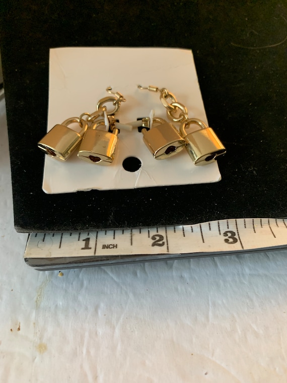 COMBINATION LOCK EARRINGS - image 1