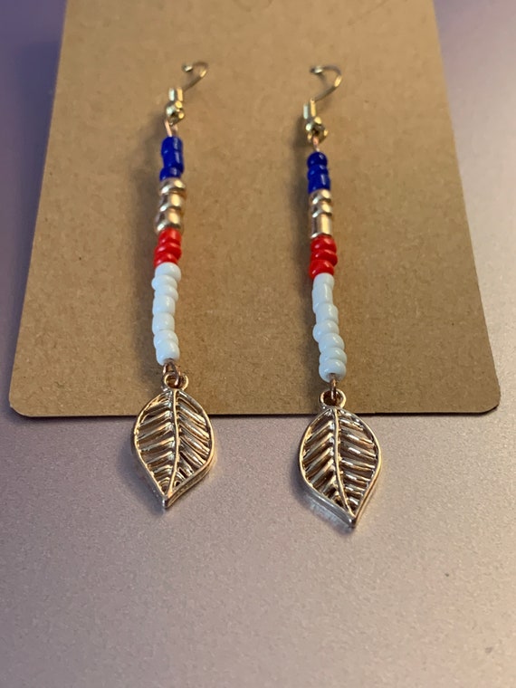 Dangling Gold Leaf Earrings - image 1