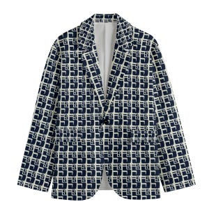 May include: A navy blue blazer with a repeating geometric pattern in white. The blazer has a notched lapel, a single-button closure, and long sleeves. The interior lining is white.