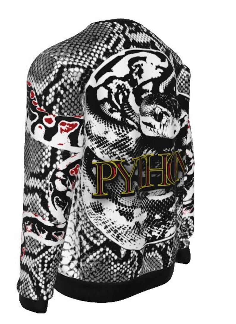 May include: A long-sleeve sweatshirt featuring a black, white, and grey snakeskin pattern. The back displays a large graphic of a coiled python with red accents and the word PYTHON printed in yellow letters with a red outline and black shadow.