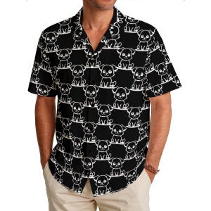 May include: Black button-down shirt with a repeating white cartoon dog pattern. The short-sleeved shirt has a classic collar and is made of a lightweight fabric. The shirt is a fun and playful addition to any wardrobe.