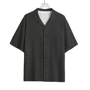 May include: Black button-down shirt with a wavy, grid-like pattern in shades of gray. The short-sleeved shirt has a classic collar and a relaxed fit, suitable for casual wear. The shirt is hanging on a white hanger.