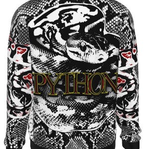 May include: A long-sleeve sweatshirt featuring a black and white snakeskin pattern throughout. The centre displays a large graphic of a coiled snake with the word PYTHON printed in yellow letters with a red outline across the snake's body.