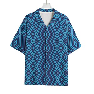 May include: A short-sleeved button-down shirt with a geometric diamond pattern in shades of blue. The shirt has a V-neck collar and is hanging on a white hanger. The pattern is a repeating design of dark and light blue diamonds.