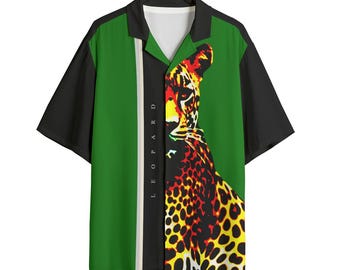 May include: Short-sleeved button-up shirt with a bold leopard print design. The shirt features a green background with a black and white stripe, black sleeves, and a leopard graphic in shades of red, yellow, and black. The word "LEOPARD" is printed vertically.