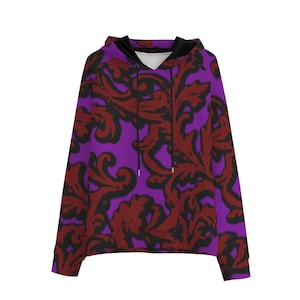 May include: A purple hoodie with a repeating pattern of dark red and black stylized floral elements. The hoodie has a drawstring and a black-lined hood. The design covers the entire garment, creating a bold and eye-catching look.