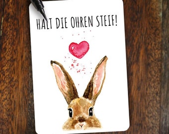 Aufmunternde Postkarte I Glückwunschkarte I Grußkarte I Halt die Ohren Steif I Hase mit Herz