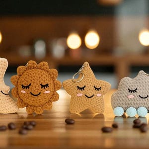 May include: A set of three ceramic mugs with a speckled, matte finish. The mugs are in shades of cream, light gray, and dark gray. Each mug has a simple, minimalist design, perfect for coffee or tea.