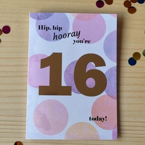 Age birthday greeting card with foil number and pastel polka dots