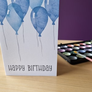Watercolour balloons birthday greeting card - blue version