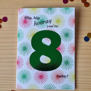 Age birthday greeting card with foil number and coloured fireworks