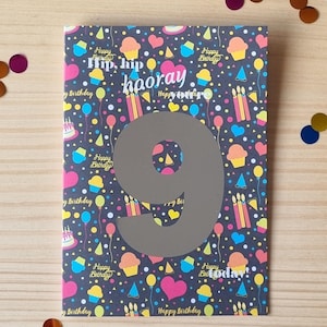 Age birthday greeting card with foil number and coloured party symbols