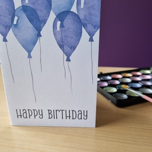Watercolour balloons birthday greeting card - indigo version