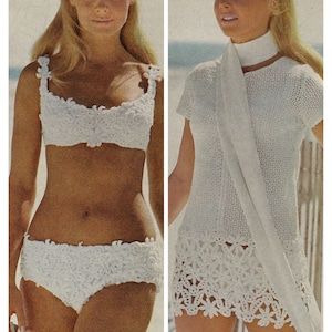 May include: Two women wearing white crocheted clothing. The woman on the left is wearing a bikini top and bottom with a floral design. The woman on the right is wearing a crocheted dress with a floral design.