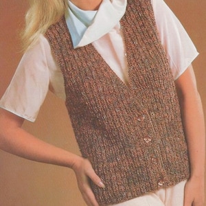 May include: A brown knitted waistcoat with a V-neck and button fastening.