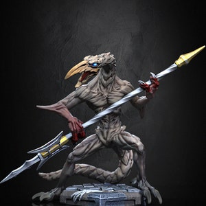 May include: A detailed miniature figurine of a creature with a bird-like head, reptilian body, and sharp claws. It holds a spear with a gold tip and a silver shaft. The figurine is painted in shades of grey, white, and gold, with blue eyes.