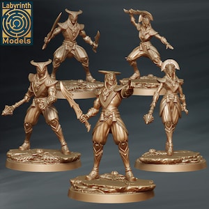 May include: Five miniature figures of warriors in a gold finish. Each figure is posed in a dynamic stance, holding weapons such as swords and staffs. The figures are standing on circular bases.