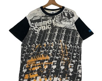 May include: Black and white t-shirt with a graphic print of a soundboard and the text "Summer Sonic 2006 8.12 Sat/14 Sun".
