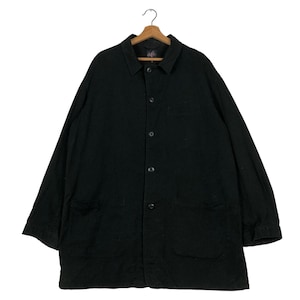 May include: A black long-sleeve button-down jacket featuring a standard collar, a front button closure, and two large patch pockets at the lower front. The garment is displayed on a wooden hanger against a plain white background.