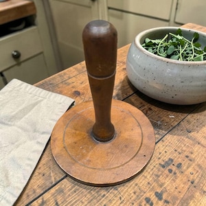 May include: A handmade wooden sign with the text "Welcome" in a playful font. The sign is painted white with a distressed finish, and features a small, decorative heart. Perfect for adding a touch of rustic charm to any home.