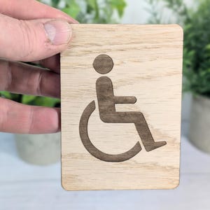 Engraved Oak Accessible Toilet Sign: Wheelchair Silhouette Plaque