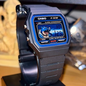 Zegarek Casio F91W Blastoise | Ręcznie robiony zegarek cyfrowy inspirowany Pokémonami | Zegarek na rękę w stylu retro gamingowym | Wyjątkowy prezent anime dla kolekcjonerów