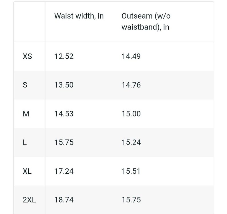 May include: A table showing the waist width and outseam measurements in inches for different sizes of clothing, from XS to 2XL.