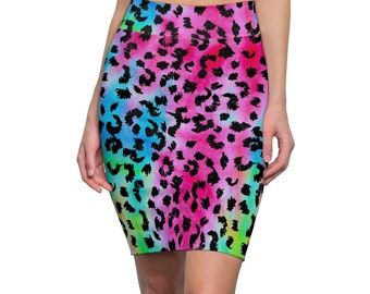 May include: A pink, blue, and green skirt with a black leopard print. The skirt is made of a stretchy fabric and has a fitted silhouette.