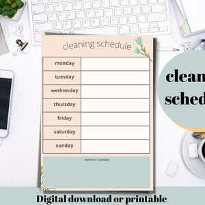 May include: A printable cleaning schedule with a light peach background and floral accents. The schedule lists each day of the week with a blank space for tasks. The text "cleaning schedule" is at the top of the page.