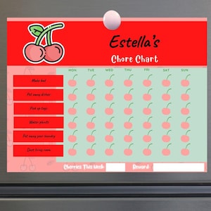 May include: A red and green magnetic chore chart with the text "Estella's Chore Chart." The chart features a cherry graphic and a weekly checklist with tasks like "Make bed" and "Put away dishes."